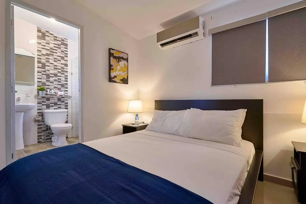 Escape Studio Apartment Close To Agora Mall contacts